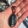 Feb2_5 "The Ancients" - Fossil Ammolite & Garnet Pendant