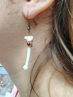 screenshot-7 Raccoon Metacarpal & Garnet Earrings